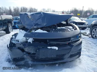 2016 Dodge Charger SXT with VIN 2C3CDXJG4GH155943, listed as a IAAI auction lot 41672667 with 105,332 mi miles. Bid and sale history available at carsss.com. Image 13.