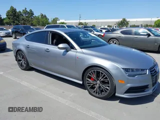 2016 Audi A7 Prestige z VIN WAU2GAFC3GN002153, wystawiony jako IAAI lot #42292870 z przebiegiem 161 013 mil mil oraz . Historia ofert i sprzedaży dostępna na DreamBid. Obrazek 1.