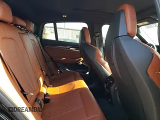 2020 BMW X4 M Competition z VIN 5YMUJ0C07L9B74720, wystawiony jako Copart lot #67831094 z przebiegiem 21 308 mil mil oraz Szkoda całkowita • Salvage title. Historia ofert i sprzedaży dostępna na DreamBid. Obrazek 10.