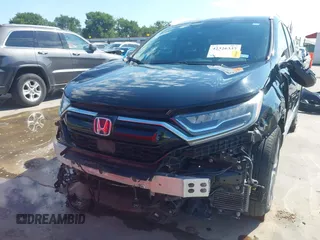2020 Honda CR-V Touring z VIN 7FART6H91LE005707, wystawiony jako IAAI lot #42326337 z przebiegiem 40 555 mil mil oraz . Historia ofert i sprzedaży dostępna na DreamBid. Obrazek 18.