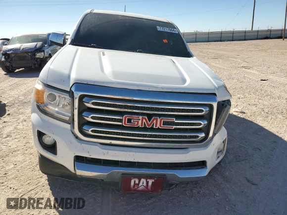 2017 GMC Canyon 4WD SLT with VIN 1GTP6DE18H1301885, listed as a Copart auction lot 77217864 with 119,413 mi miles and Salvage Title. Bid and sale history available at carsss.com. Image 5.