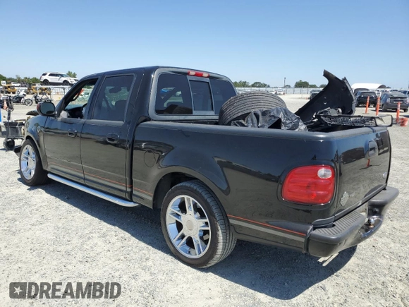 2001 Ford F-150 XLT with VIN 1FTRW07LX1KB47311, listed as a Copart auction lot 58848395 with Not provided miles and Salvage title. Bid and sale history available at DreamBid. Image 2.