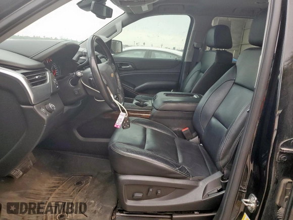 2020 Chevrolet Tahoe LT with VIN 1GNSCBKC5LR203301, listed as a Copart auction lot 57071315 with 106,376 mi miles and Salvage title. Bid and sale history available at DreamBid. Image 7.