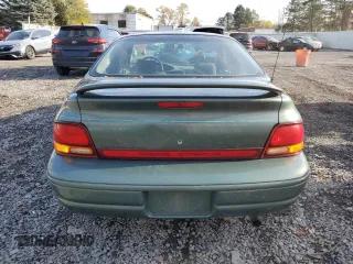 1996 Dodge Stratus z VIN 1B3EJ46XXTN285619, wystawiony jako Copart lot #78267884 z przebiegiem Nie podano mil oraz Szkoda całkowita • Salvage title. Historia ofert i sprzedaży dostępna na DreamBid. Obrazek 6.