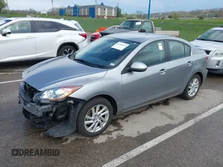 2012 Mazda 3 i Touring with VIN JM1BL1V71C1677133, listed as a IAAI auction lot 41991234 with 104,610 mi miles and . Bid and sale history available at DreamBid. Image 2.