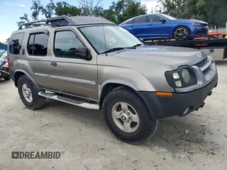 2004 Nissan Xterra XE with VIN 5N1ED28Y14C659060, listed as a Copart auction lot 64620525 with 176,090 mi miles and Clean title. Bid and sale history available at DreamBid. Image 4.