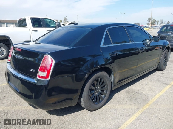 2014 Chrysler 300 with VIN 2C3CCAAG9EH264914, listed as a IAAI auction lot 42003052 with 103,789 mi miles. Bid and sale history available at carsss.com. Image 4.
