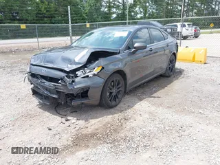 2020 Ford Fusion SE z VIN 3FA6P0HD6LR160147, wystawiony jako IAAI lot #42499983 z przebiegiem 73 971 mil mil oraz . Historia ofert i sprzedaży dostępna na DreamBid. Obrazek 18.