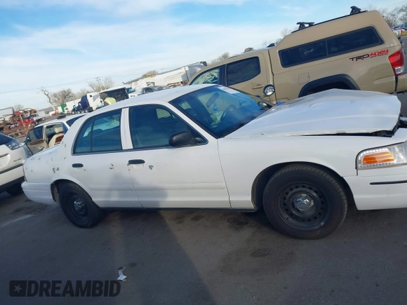 2000 Ford Crown Victoria Police Interceptor z VIN 2FAFP71W9YX149303, wystawiony jako IAAI lot #41888402 z przebiegiem 148 081 mil mil oraz . Historia ofert i sprzedaży dostępna na DreamBid. Obrazek 13.