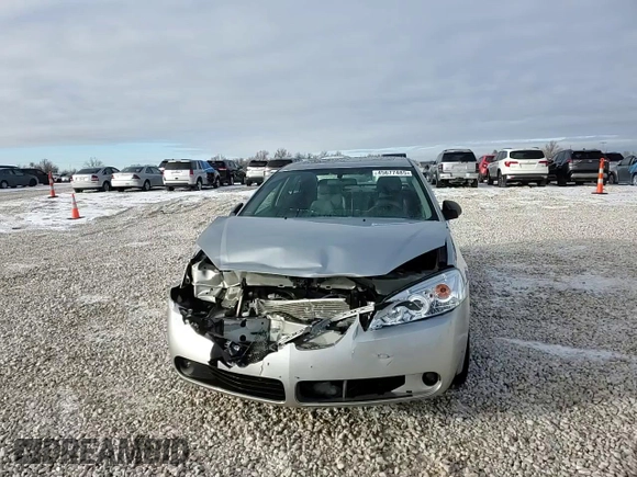 2006 Pontiac G6 6-Cyl z VIN 1G2ZG558764174412, wystawiony jako Copart lot #45677485 z przebiegiem 286 524 mil mil oraz Czysty tytuł • Clean title. Historia ofert i sprzedaży dostępna na DreamBid. Obrazek 10.