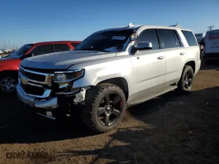 2015 Chevrolet Tahoe Commercial with VIN 1GNSK2EC9FR652628, listed as a Copart auction lot 82393714 with 122,001 mi miles and Salvage Title. Bid and sale history available at carsss.com. Image 1.