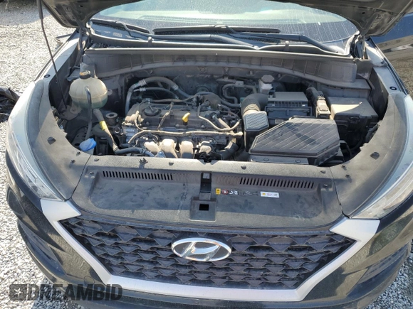2020 Hyundai Tucson SE z VIN KM8J23A43LU250469, wystawiony jako Copart lot #56179735 z przebiegiem 113 473 mil mil oraz Czysty tytuł • Clean title. Historia ofert i sprzedaży dostępna na DreamBid. Obrazek 12.