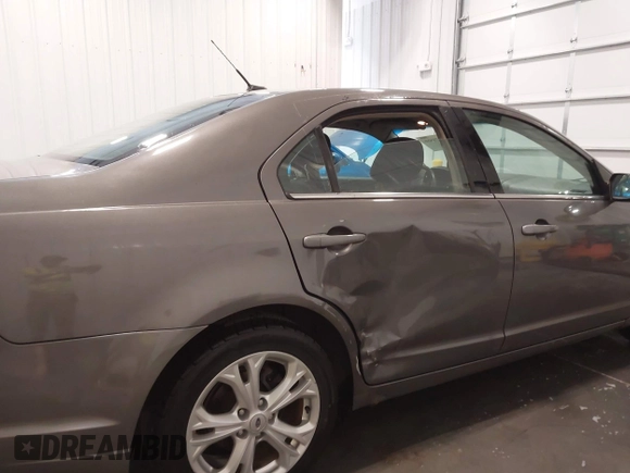 2012 Ford Fusion SE with VIN 3FAHP0HG7CR249339, listed as a IAAI auction lot 41978356 with 122,297 mi miles and . Bid and sale history available at DreamBid. Image 6.