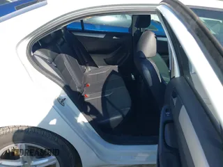 2014 Volkswagen Jetta SE z VIN 3VWD07AJ1EM281910, wystawiony jako IAAI lot #42823665 z przebiegiem 86 182 mil mil oraz . Historia ofert i sprzedaży dostępna na DreamBid. Obrazek 8.