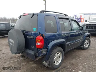 2004 Jeep Liberty Limited with VIN 1J4GL58K34W112569, listed as a IAAI auction lot 42021937 with 181,814 mi miles. Bid and sale history available at carsss.com. Image 6.