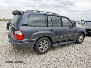 2003 Lexus LX 470 z VIN JTJHT00W033530306, wystawiony jako Copart lot #57162675 z przebiegiem 185 458 mil mil oraz Szkody całkowita. Historia ofert i sprzedaży dostępna na DreamBid. Obrazek 3.