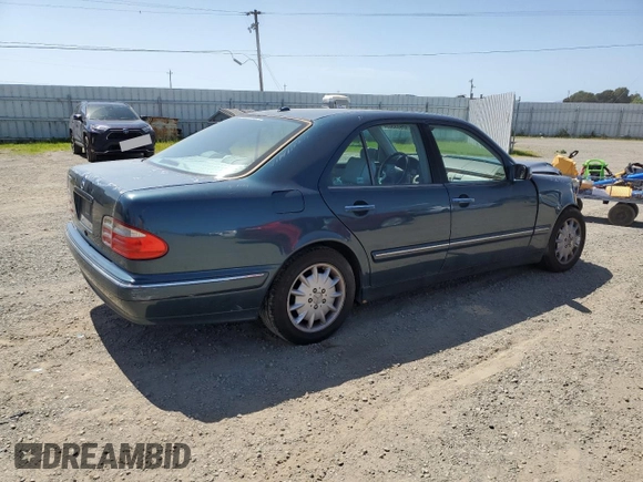 2000 Mercedes-Benz E-Class with VIN WDBJF65J1YB151080, listed as a Copart auction lot 54421955 with 392,612 mi miles and Salvage Title. Bid and sale history available at carsss.com. Image 3.