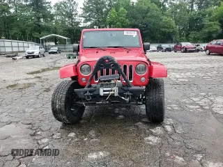 2016 Jeep Wrangler Unlimited Sahara z VIN 1C4BJWEG9GL219739, wystawiony jako Copart lot #59686315 z przebiegiem 59 242 mil mil oraz Szkoda całkowita • Salvage title. Historia ofert i sprzedaży dostępna na DreamBid. Obrazek 14.