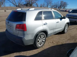 2011 Kia Sorento LX with VIN 5XYKTDA2XBG066656, listed as a IAAI auction lot 41624350 with 166,330 mi miles. Bid and sale history available at carsss.com. Image 4.