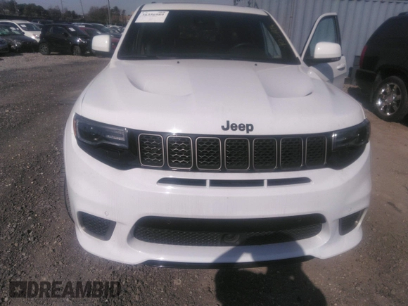 2020 Jeep Grand Cherokee Trackhawk z VIN 1C4RJFN94LC117596, wystawiony jako IAAI lot #36356989 z przebiegiem 37 994 mil mil oraz . Historia ofert i sprzedaży dostępna na DreamBid. Obrazek 6.