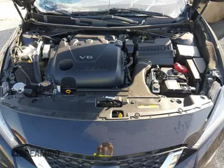 2019 Nissan Maxima Platinum z VIN 1N4AA6AV3KC378092, wystawiony jako IAAI lot #40527428 z przebiegiem 108 643 mil mil oraz . Historia ofert i sprzedaży dostępna na DreamBid. Obrazek 10.