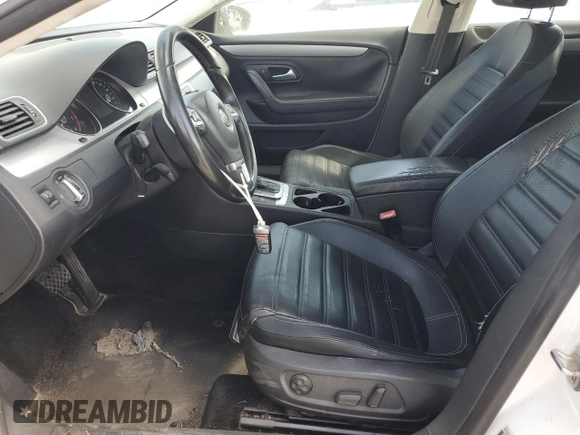 2013 Volkswagen CC Sport with VIN WVWBP7ANXDE565694, listed as a Copart auction lot 77947514 with 180,160 mi miles and Salvage Title. Bid and sale history available at carsss.com. Image 7.