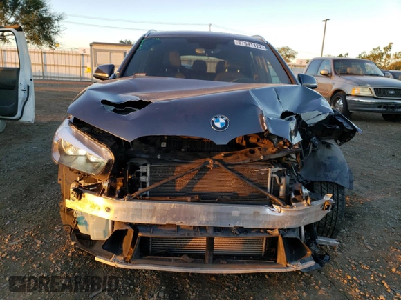 2017 BMW X1 xDrive28i with VIN WBXHT3C30H5F71865, listed as a Copart auction lot 67841122 with 75,471 mi miles. Bid and sale history available at carsss.com. Image 5.