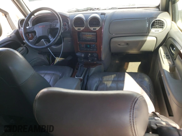 2003 GMC Envoy SLT z VIN 1GKET16SX36234308, wystawiony jako Copart lot #45653505 z przebiegiem 184 324 mil mil oraz Szkoda całkowita • Salvage title. Historia ofert i sprzedaży dostępna na DreamBid. Obrazek 8.