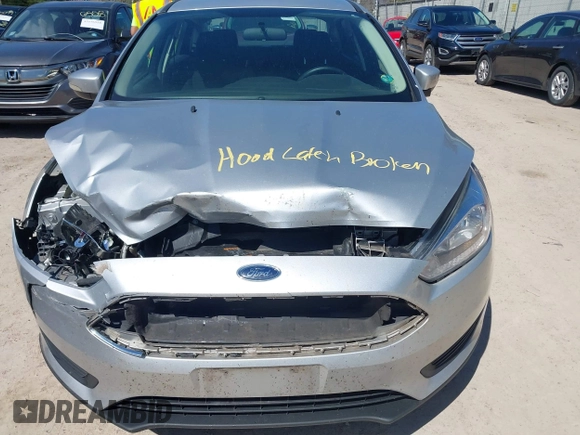 2017 Ford Focus SE z VIN 1FADP3F21HL237412, wystawiony jako IAAI lot #42188886 z przebiegiem 148 355 mil mil oraz . Historia ofert i sprzedaży dostępna na DreamBid. Obrazek 6.