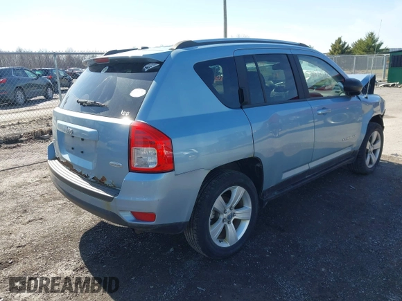 2013 Jeep Compass Latitude with VIN 1C4NJDEB2DD263920, listed as a IAAI auction lot 41832542 with 128,018 mi miles. Bid and sale history available at carsss.com. Image 4.