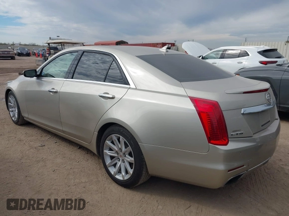 2014 Cadillac CTS Luxury RWD with VIN 1G6AR5SX6E0132580, listed as a IAAI auction lot 41349654 with 113,157 mi miles. Bid and sale history available at carsss.com. Image 3.
