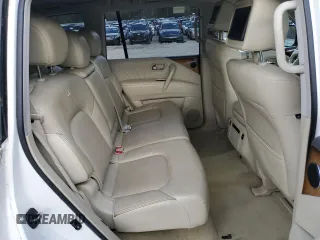 2012 Infiniti QX56 8-passenger z VIN JN8AZ2NC3C9317364, wystawiony jako Copart lot #49665145 z przebiegiem 228 371 mil mil oraz Czysty tytuł • Clean title. Historia ofert i sprzedaży dostępna na DreamBid. Obrazek 11.