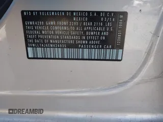 2014 Volkswagen Jetta TDI w/Premium with VIN 3VWLL7AJ6EM424935, listed as a IAAI auction lot 41533634 with 64,028 mi miles and . Bid and sale history available at DreamBid. Image 9.