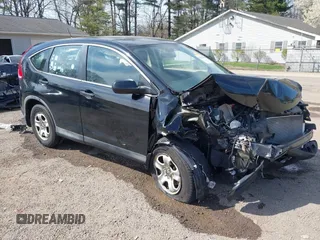 2014 Honda CR-V LX with VIN 2HKRM4H36EH721502, listed as a IAAI auction lot 42070358 with 129,319 mi miles. Bid and sale history available at carsss.com. Image 1.