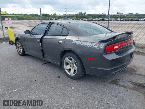 2014 Dodge Charger Police z VIN 2C3CDXAT9EH191184, wystawiony jako IAAI lot #42468882 z przebiegiem 202 790 mil mil oraz . Historia ofert i sprzedaży dostępna na DreamBid. Obrazek 3.