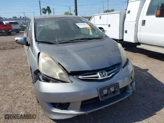 2009 Honda Fit Sport w/Navi with VIN JHMGE88619S020572, listed as a IAAI auction lot 41755126 with 202,358 mi miles. Bid and sale history available at carsss.com. Image 1.