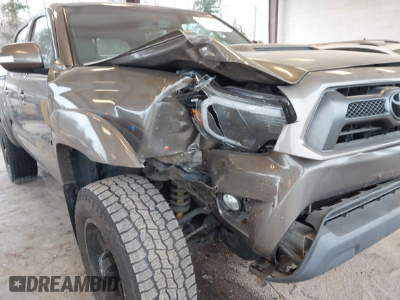 2013 Toyota Tacoma z VIN 3TMLU4EN9DM124980, wystawiony jako IAAI lot #41576747 z przebiegiem 209 883 mil mil oraz . Historia ofert i sprzedaży dostępna na DreamBid. Obrazek 6.