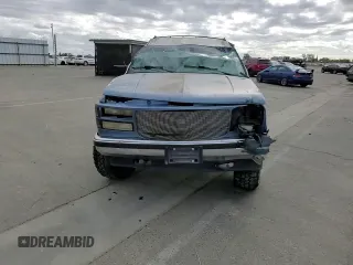 1995 GMC Yukon with VIN 1GKEK18K6SJ710419, listed as a Copart auction lot 80778474 with 215,789 mi miles and Salvage Title. Bid and sale history available at carsss.com. Image 12.