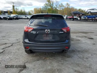 2015 Mazda CX-5 Grand Touring with VIN JM3KE4DY2F0480639, listed as a Copart auction lot 75248594 with 104,652 mi miles and Non Repairable. Bid and sale history available at carsss.com. Image 6.
