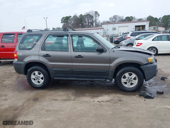2005 Ford Escape XLS Value with VIN 1FMYU92Z35KA20497, listed as a IAAI auction lot 41509893 with 149,866 mi miles. Bid and sale history available at carsss.com. Image 13.
