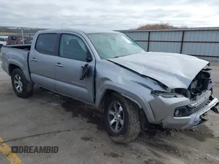 2020 Toyota Tacoma SR5 with VIN 3TMCZ5AN7LM316281, listed as a IAAI auction lot 41947418 with 93,276 mi miles and . Bid and sale history available at DreamBid. Image 1.
