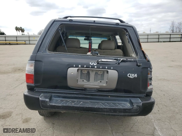 1997 Infiniti QX4 with VIN JNRAR05Y9VW016811, listed as a Copart auction lot 46103275 with 252257 miles and Salvage Title. Bid and sale history available at carsss.com. Image 6.