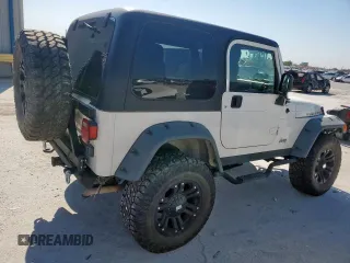 2004 Jeep Wrangler Rubicon z VIN 1J4FA69S34P757352, wystawiony jako Copart lot #52971745 z przebiegiem 139 855 mil mil oraz Szkoda całkowita • Salvage title. Historia ofert i sprzedaży dostępna na DreamBid. Obrazek 3.
