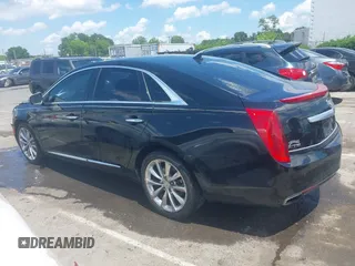 2013 Cadillac XTS Luxury z VIN 2G61P5S37D9101989, wystawiony jako IAAI lot #42242641 z przebiegiem 243 006 mil mil oraz . Historia ofert i sprzedaży dostępna na DreamBid. Obrazek 14.
