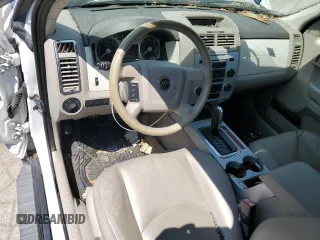 2008 Mercury Mariner with VIN 4M2CU81158KJ13802, listed as a Copart auction lot 57981485 with 109,225 mi miles and Salvage title. Bid and sale history available at DreamBid. Image 8.