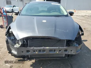 2017 Ford Focus SE with VIN 1FADP3F25HL202470, listed as a Copart auction lot 59941835 with 142,628 mi miles and Salvage title. Bid and sale history available at DreamBid. Image 5.