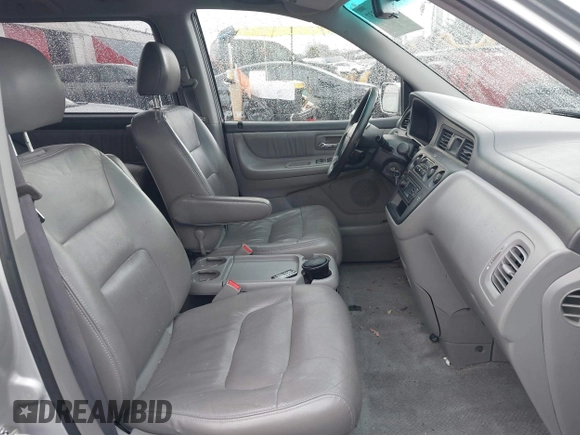 2004 Honda Odyssey EX-L with VIN 5FNRL18934B016420, listed as a IAAI auction lot 41473237 with 188,659 mi miles and . Bid and sale history available at DreamBid. Image 5.