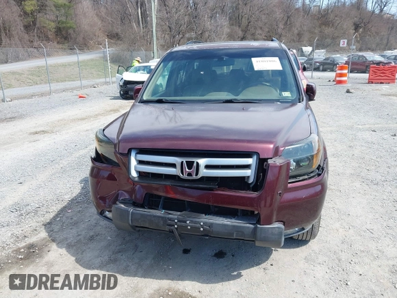 2007 Honda Pilot EX-L with VIN 5FNYF18587B021312, listed as a IAAI auction lot 41801006 with 261,842 mi miles. Bid and sale history available at carsss.com. Image 12.