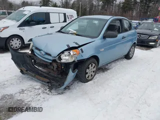 2008 Hyundai Accent GS with VIN KMHCM36C98U062601, listed as a IAAI auction lot 41565161 with 148,281 mi miles. Bid and sale history available at carsss.com. Image 2.