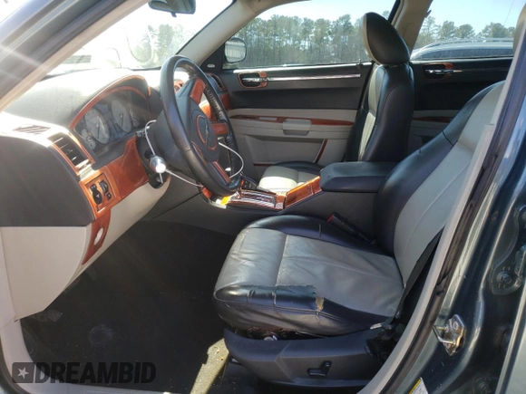 2006 Chrysler 300 Touring with VIN 2C3KA53G36H309241, listed as a Copart auction lot 48710025 with 117,544 mi miles and Salvage Title. Bid and sale history available at DreamBid. Image 7.